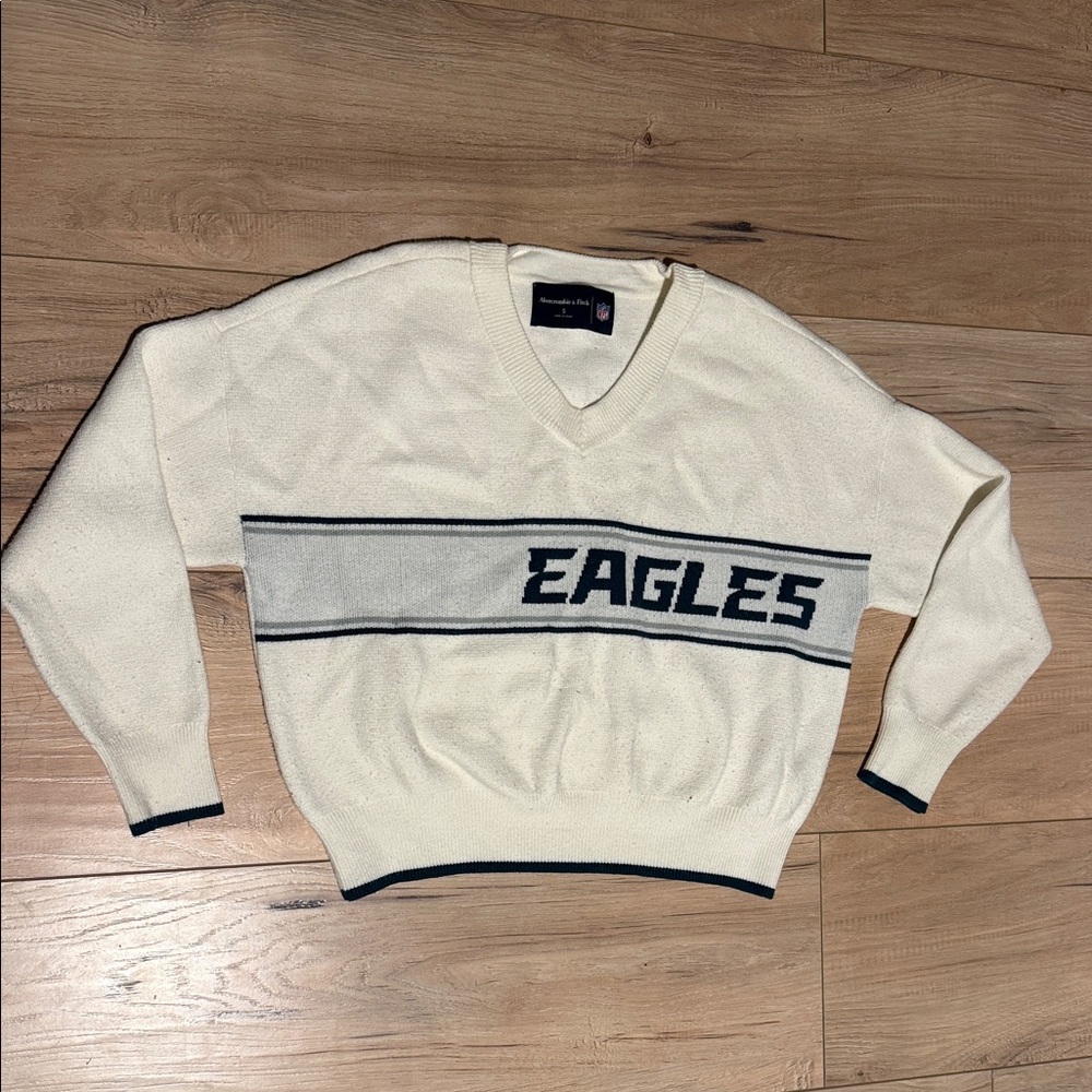 Abercrombie & Fitch White V-Neck Sweater with Black Eagles Design